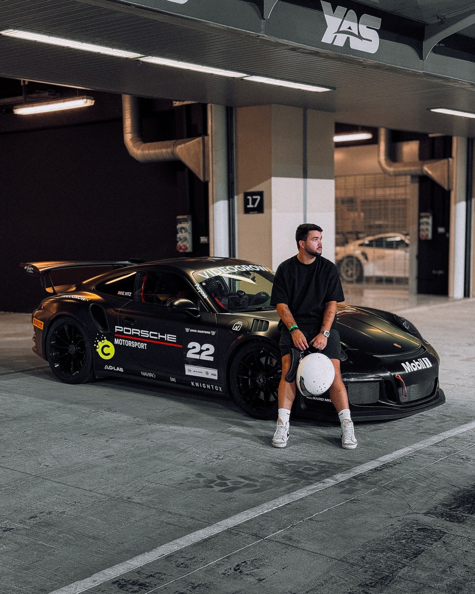 Elliott with the car in the Yas garage